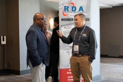 Cliff White, left, AkzoNobel, and Corey Zimmerman, right, Zimmerman Auto Body Supply.